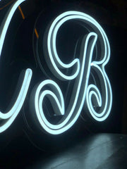 double writing initials neon